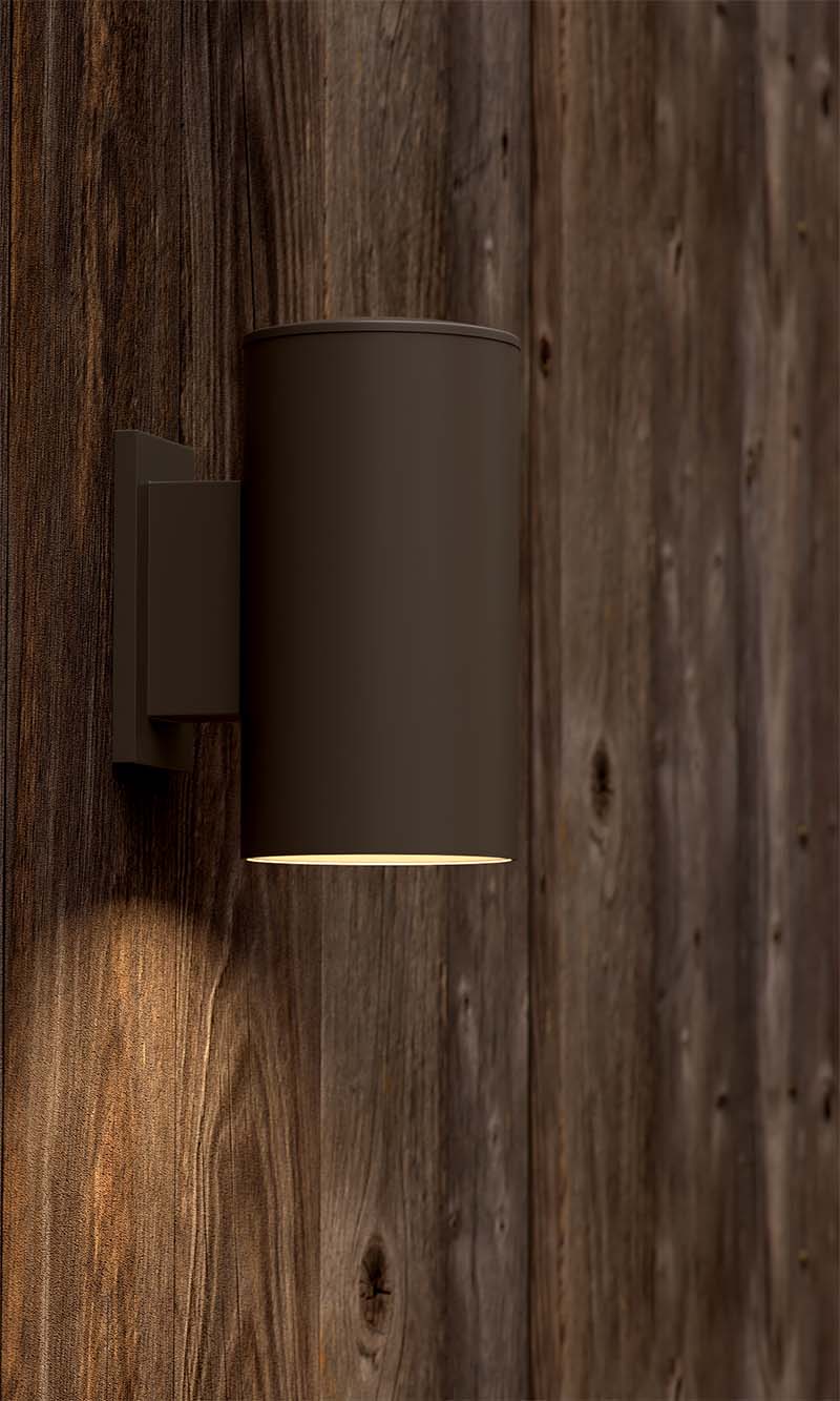 DMF light fixture out on wooden wall paneling